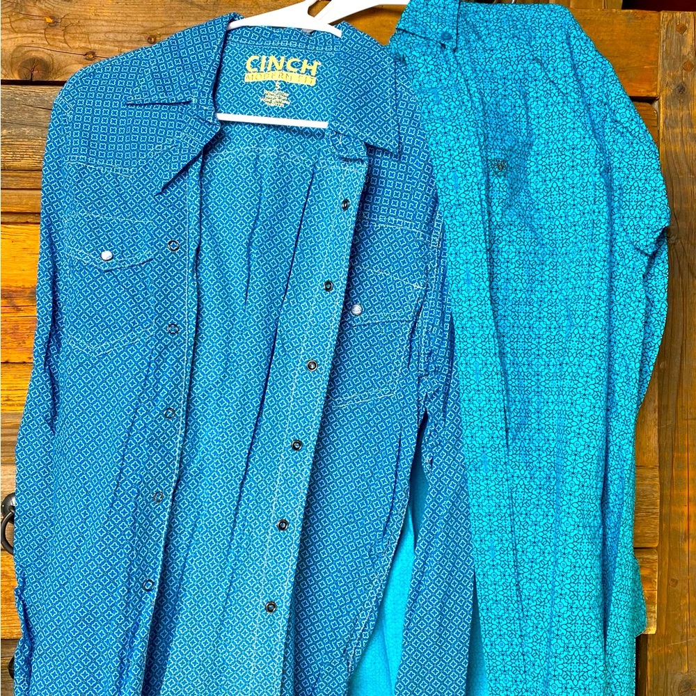 Two Men’s Ariat and Cinch shirts